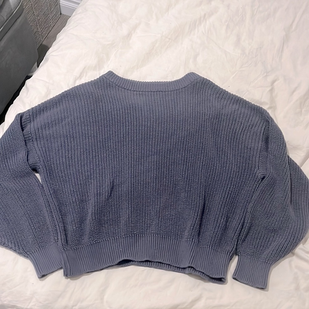 greyish blue knitted sweater